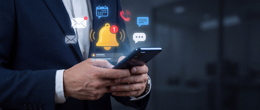 Businessman using smartphone with digital notification icons for modern communication with representing notifications communication