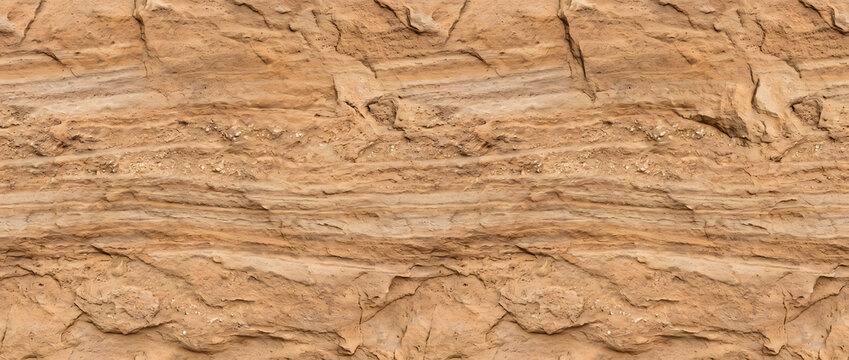 Sandstone texture featuring realistic layered natural rock surface with rugged sediment patterns for seamless backgrounds and professional creative design