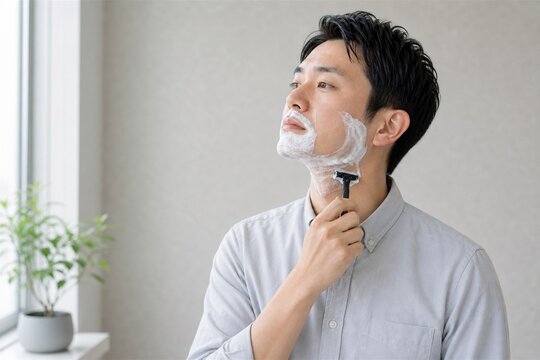 首元を剃る男性のシンプルなシェービング