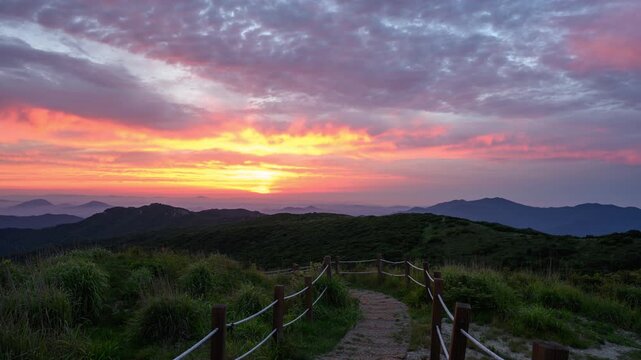 Mountain Trail at Sunrise with Colorful Sky Timelapse