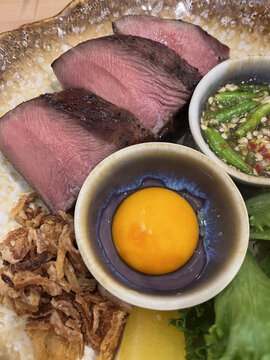 Cooked a sous vide beef tongue with pickled eggs yolk and spicy dipping sauce.