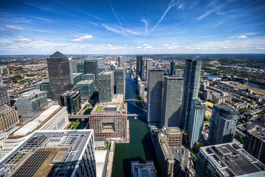 Wde, panoramic view of the skyline at the financial district Canary Wharf in London with office and residential skyscrapers