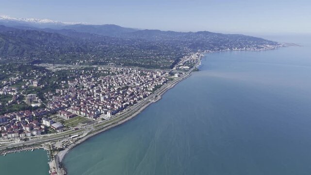 Aerial Drone Footage of Ardesen Town Center in Rize Turkey Featuring Black Sea Urban Landscape, Green Hills and Mountain Scenery