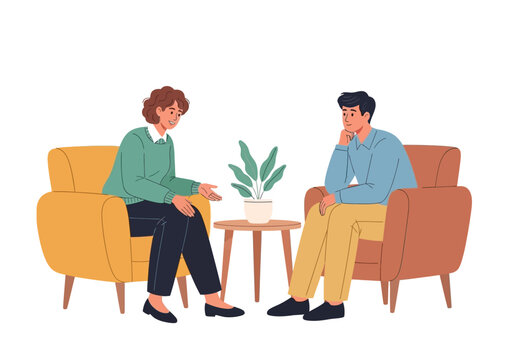 Two people sitting on armchairs talking.