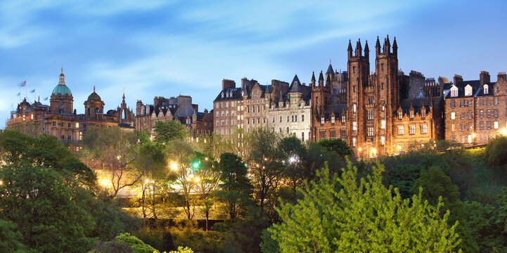 Edinburgh Old town of street Mound with New College, The University, Scotland panorama at night