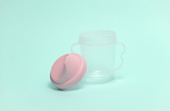 Open Drinking bowl for baby on a blue background.