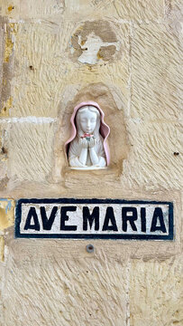 Religious Ave Maria Inscription on a Traditional Maltese Limestone Wall