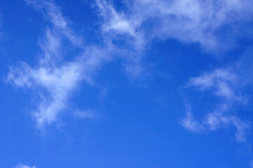 Obraz premium Blue sky background with tiny clouds, nature abstract background