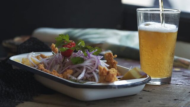 Traditional Peruvian Ceviche with corn and sheet potatoe with Cold Beer