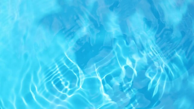 Abstract water surface swimming pool with caustic ripples and reflections, texture of waves under sunlight.