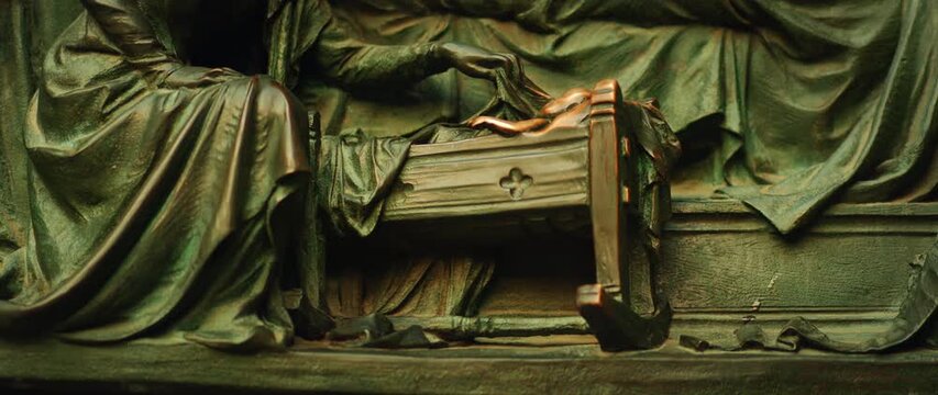 Intricately sculpted religious scene in bronze relief at Milan Cathedral, Italy