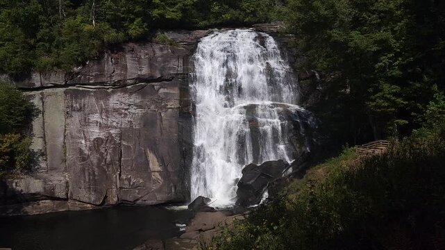 White water falling over the near vertical, 150-foot cliff to form Rainbow Falls near Gorges State Park, Nantahala National Forest, in Western North Carolina.