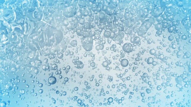 Super Slow Motion Shot of Oil Bubbles Floating in Water at 1000fps.