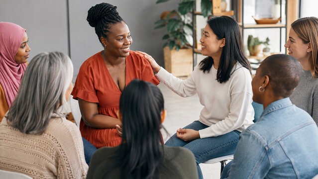 Diverse women sharing support in a community circle