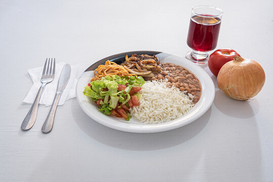 Brazilian cuisine dish with rice and beans plate