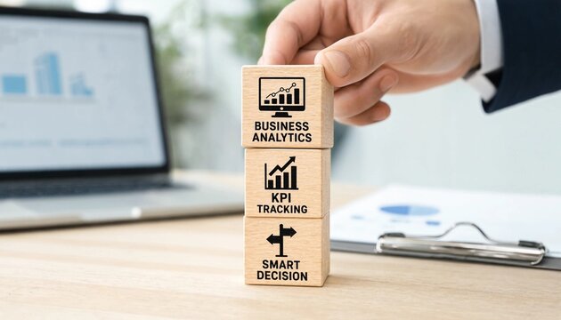 Businessman placing wooden blocks with business analytics and smart decision concepts on office desk with laptop and documents
