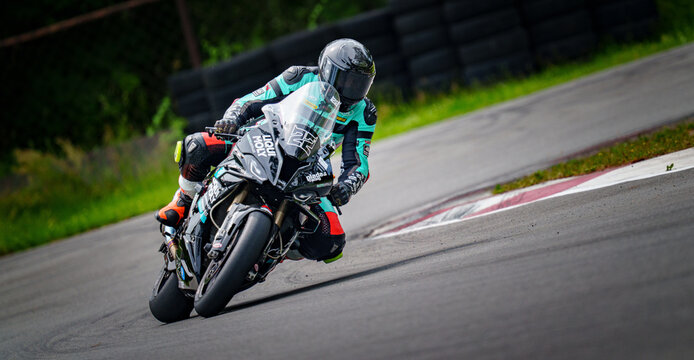 Regular training in Riga, Latvia, Bikernieki on 12-05-2026  Motorcyclist leaning into a turn on a race track