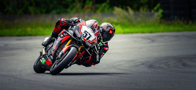 Regular training in Riga, Latvia, Bikernieki on 12-05-2026  Motorcyclist leaning into a curve on an asphalt race track