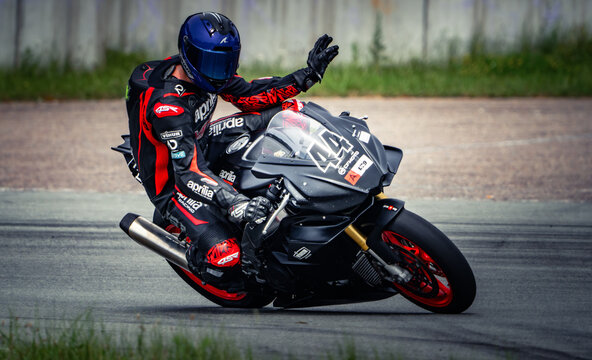 Regular training in Riga, Latvia, Bikernieki on 12-05-2026  Motorcyclist leaning into a high-speed corner on paved track