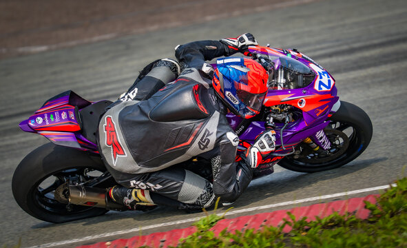 Regular training in Riga, Latvia, Bikernieki on 12-05-2026  Motorcyclist racing on a wet track