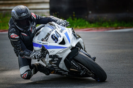 Regular training in Riga, Latvia, Bikernieki on 12-05-2026  Motorcyclist leaning into a turn on a racetrack