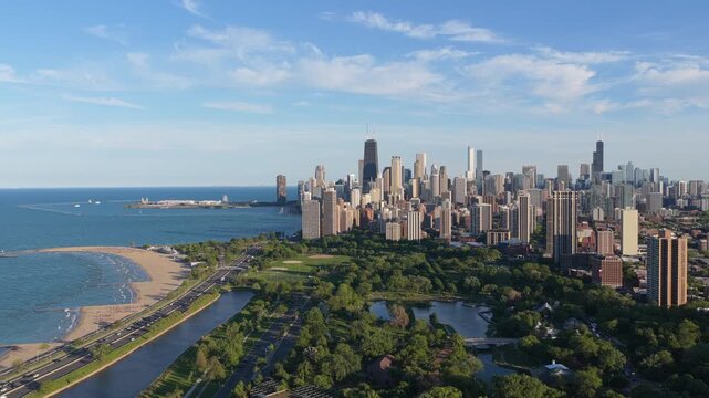 Iconic Chicago skyline featuring Lincoln Park, North Avenue Beach, Lake Michigan shoreline with downtown skyscrapers like John Hancock Center and Willis Tower