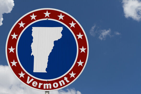 Vermont map with stars on a US red, white and blue road sign
