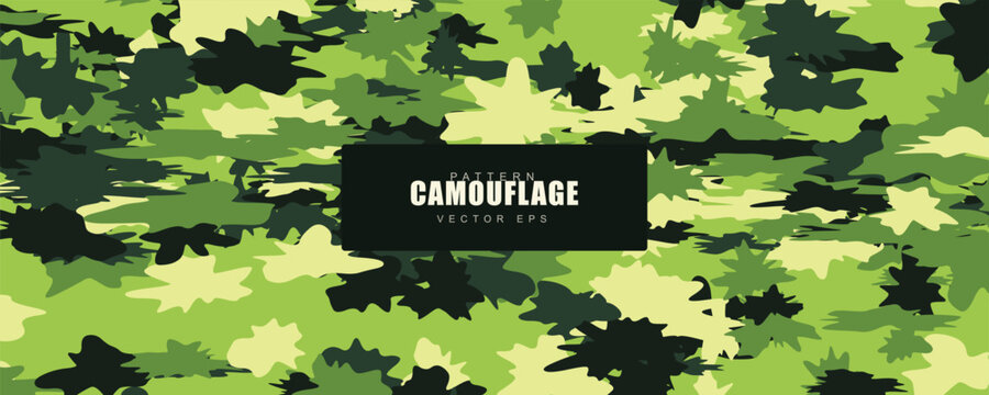 Abstract green camouflage pattern with dark shapes for military or outdoor themes