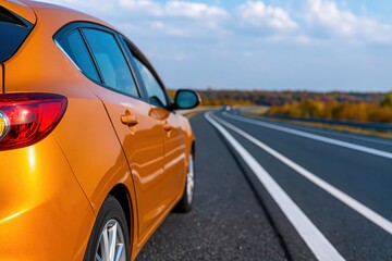 Fototapeta premium Car stopped on a country road as an orange automobile vehicle for travel journey