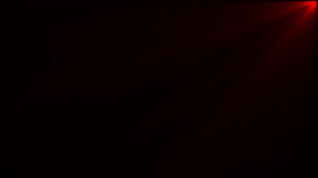Intense red light flare emanating from the right corner against a solid black background creating a soft glowing ray effect for overlays
