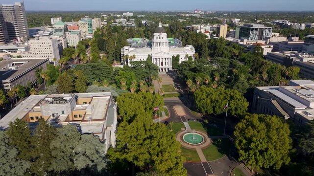 Aerial views show the west side of the California State Capitol and the new annex under construction to the east.
