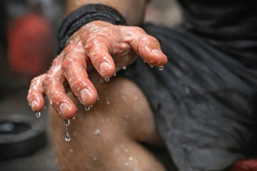Fototapeta premium A close-up shot of human hands submerged in water, ideal for uses such as hygiene or aquatic-themed content