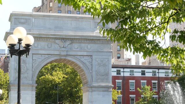 New York City Manhattan Washington Square Park arch, United States. Marble historic monument Greenwich Village. 5 fifth avenue triumphal arch. Autumn fall garden greenery. George Washington memorial.