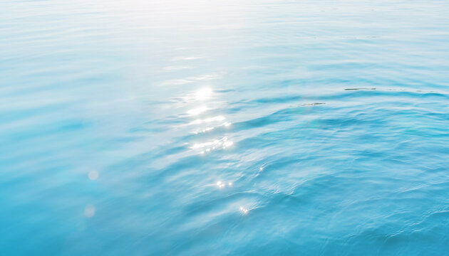 Soft blue sea surface with sparkling sunglint 爽やかな夏の光が反射する水面テクスチャ