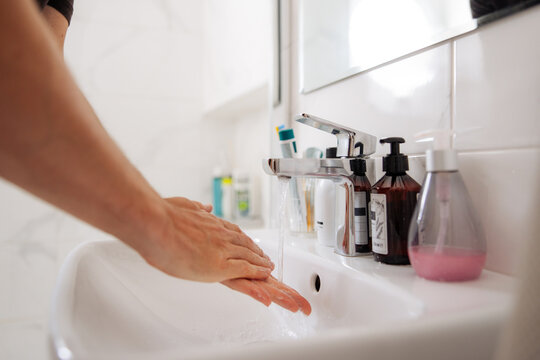 Person Washing Hands 
