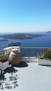 White architecture in Santorini island, Greece. Blue sea and the blue sky at sunny day. Luxury resort. Travel and summer vacation concept. Vertical video
