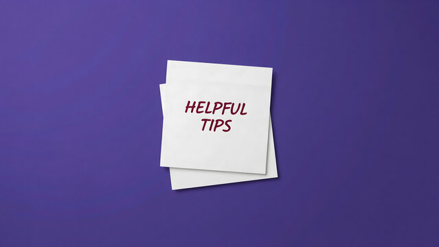 White sticky notes with the text helpful tips on a purple background