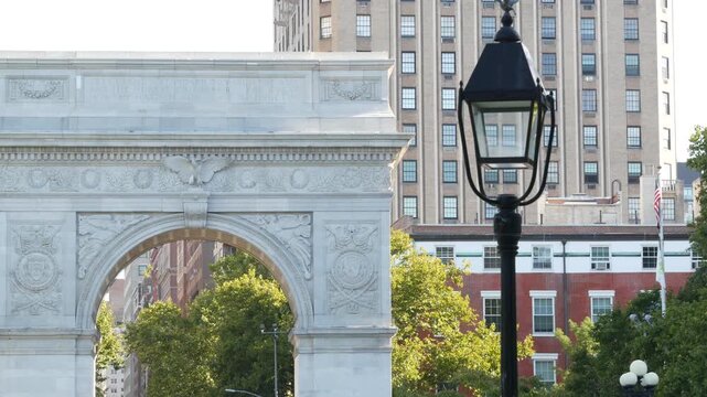 New York City Manhattan Washington Square Park arch, United States. Marble historic monument Greenwich Village. 5 fifth avenue triumphal arch. Autumn fall garden greenery. George Washington memorial.