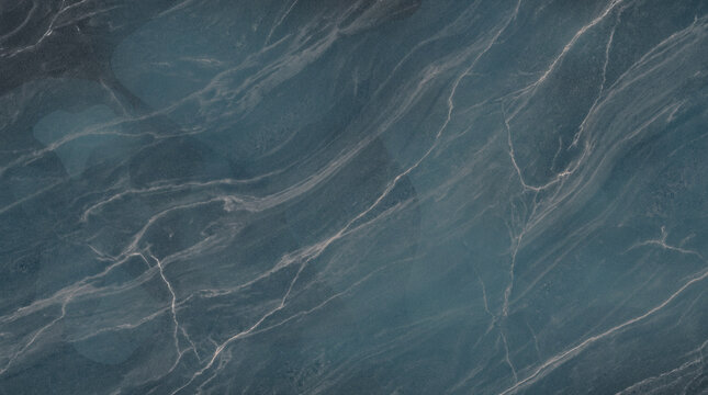 Abstract dramatic moody blue dark stone luxury marble texture background surface pattern featuring natural elegant white vein design.