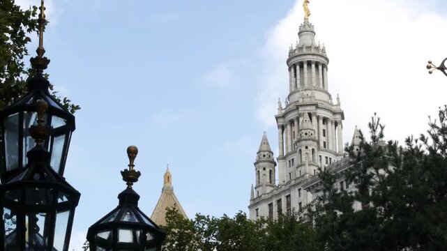 New York City Downtown Civic Center, United States of America. Manhattan municipal building 1914, old historic architecture. Government administration authority from City Hall park. Fountain, lantern.