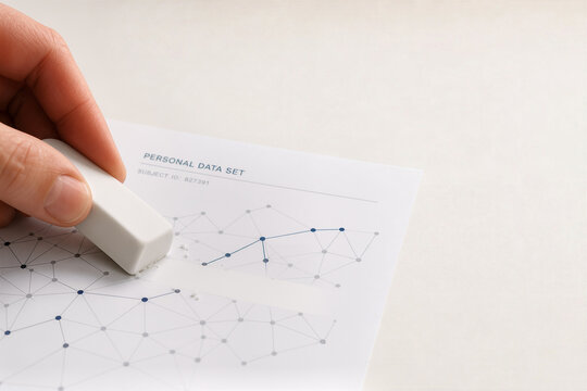 White eraser deleting precise line on printed neural network data sheet symbolizing machine unlearning right to be forgotten data privacy GDPR compliance AI ethics algorithmic accountability
