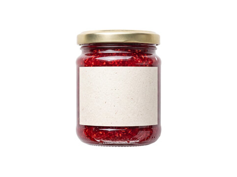 A glass container holding vibrant red raspberry preserves is presented with a golden lid and a blank label ready for custom branding and product information