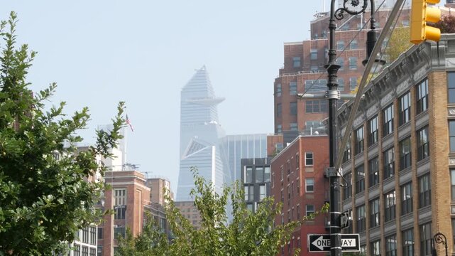 New York City Manhattan Midtown Hudson Yards district towers, United States. Urban skyscraper building architecture, contrast. Cityscape of Meatpacking district, Chelsea. Brick houses, historic market