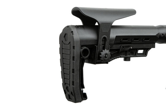 Close-up of an adjustable black tactical rifle buttstock isolated on a clean white back