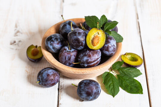 Fresh organic plums in the bowl	