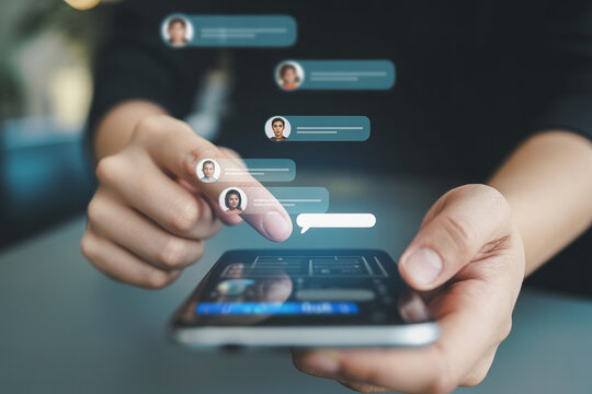 Person using smartphone with chat interface and profile pictures.