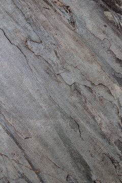 Black marble floor with natural patterns.