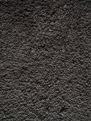 Fototapeta premium black leather texture Dark rough concrete wall texture background for industrial design Close up of dark gray rough concrete surface with coarse gravel texture. Abstract grunge Makassar