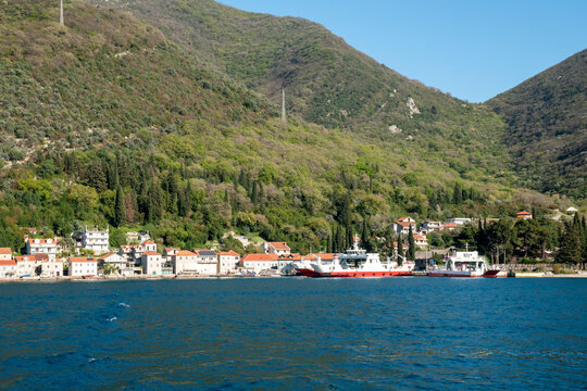 Ferry crossing in Montenegro between Kamenari and Lepetane, a vital transport link.