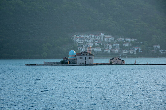 View of Our Lady of the Rocks Island in Kotor Bay, Montenegro, a popular tourist attraction.